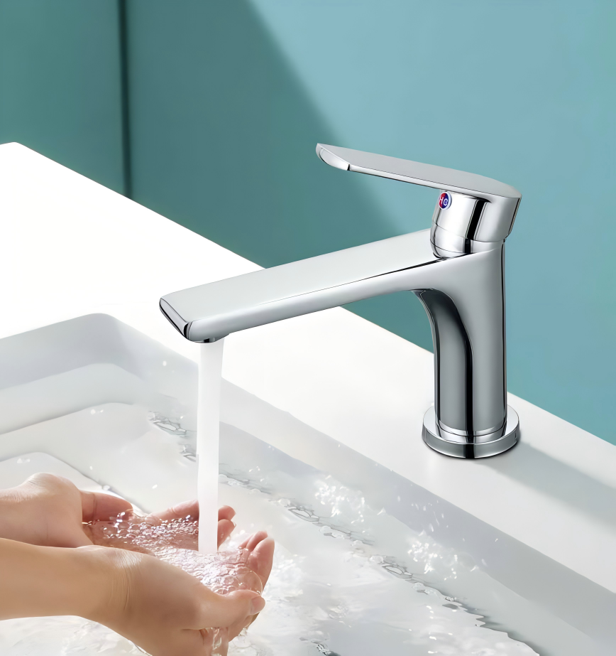Chrome bathroom tap running water
